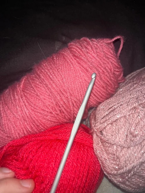 colorful yarn with crochet hook