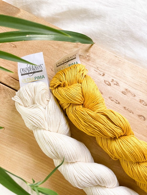 white yarn with yellow yarn