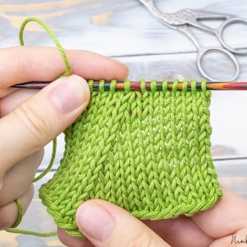 knit two stitches together.