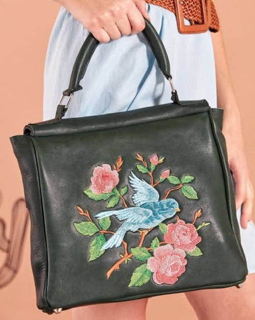 Embroider flowers on Leather